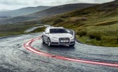 Audi A6 Allroad Sport на извилистой дороге