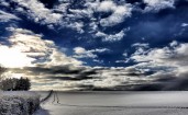 Облака над полем зимой