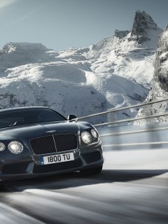 Bentley на зимней дороге 240x320