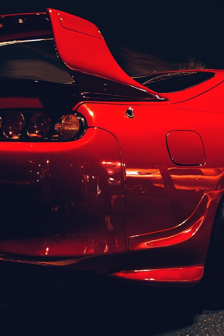 Красная Toyota Supra, вид сзади 720x1080