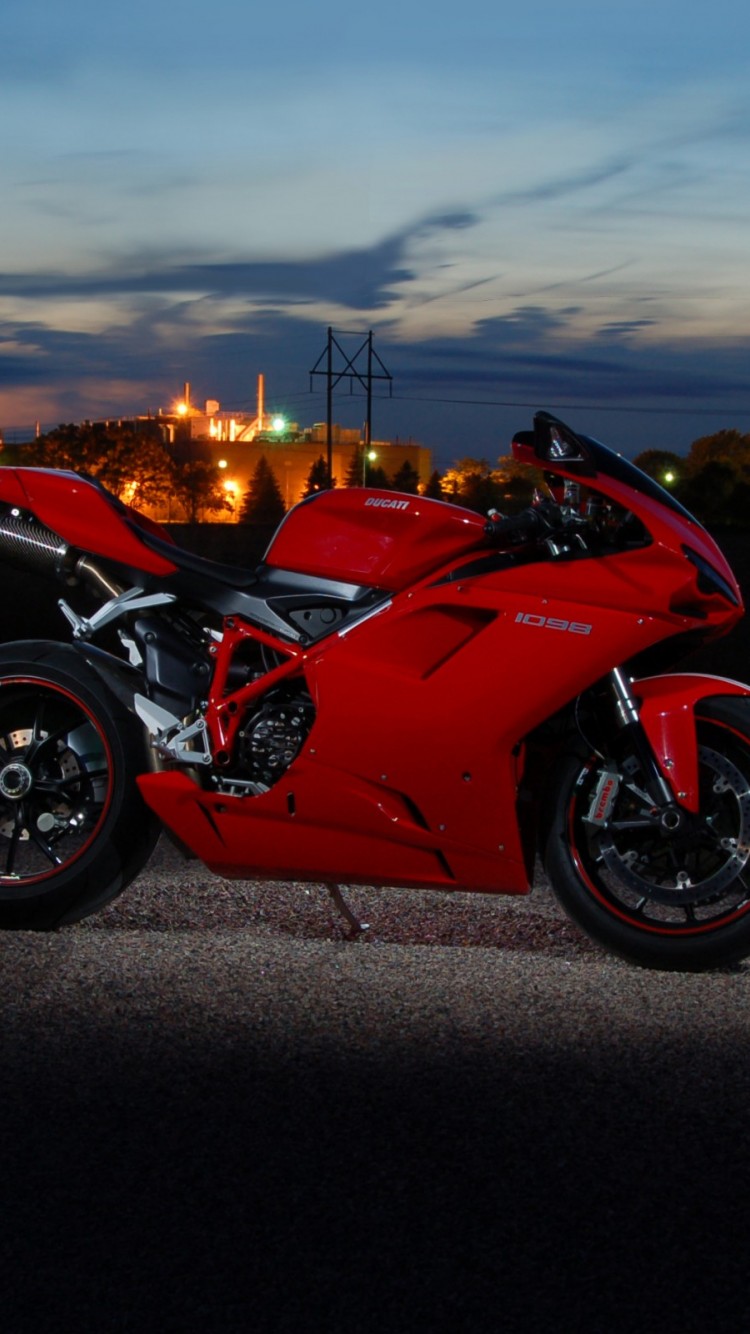 Красный мотоцикл Ducati 750x1334